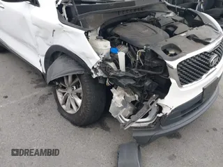 2017 Kia Sorento LX with VIN 5XYPG4A50HG232597, listed as a IAAI auction lot 42196386 with 107,514 mi miles and . Bid and sale history available at DreamBid. Image 6.