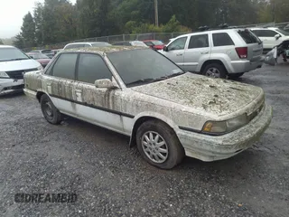1991 Toyota Camry z VIN 4T1SV22E1MU450491, wystawiony jako IAAI lot #40356634 z przebiegiem 285 677 mil mil oraz . Historia ofert i sprzedaży dostępna na DreamBid. Obrazek 1.