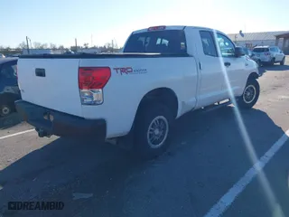2010 Toyota Tundra 4WD Truck with VIN 5TFUY5F17AX155936, listed as a IAAI auction lot 41285463 with 96,530 mi miles. Bid and sale history available at carsss.com. Image 4.