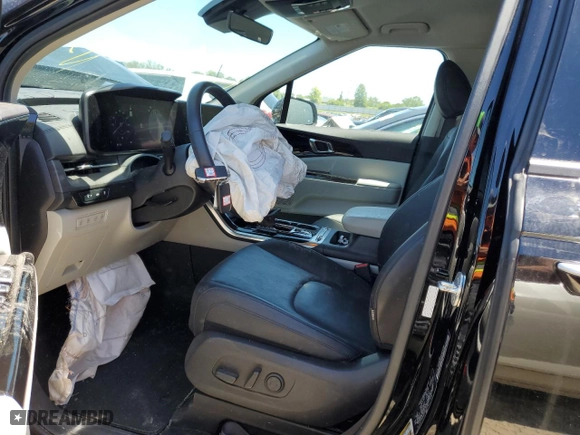 2023 Kia Carnival SX Prestige with VIN KNDNE5H39P6211336, listed as a Copart auction lot 57031024 with 22,961 mi miles and Salvage Title. Bid and sale history available at carsss.com. Image 7.