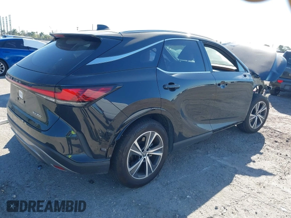 2024 Lexus RX with VIN JTJCHMAA3R2018477, listed as a IAAI auction lot 41738156 with 7,480 mi miles. Bid and sale history available at carsss.com. Image 4.