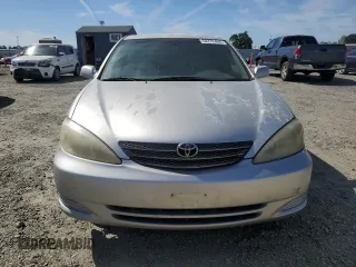 2004 Toyota Camry LE with VIN 4T1BE32K14U263747, listed as a Copart auction lot 52775455 with 170,574 mi miles and Clean Title. Bid and sale history available at carsss.com. Image 5.