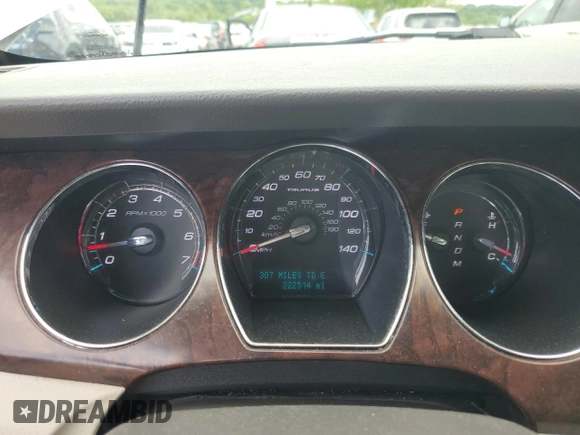 2012 Ford Taurus Limited z VIN 1FAHP2FW0CG126852, wystawiony jako Copart lot #56157325 z przebiegiem 222 514 mil mil oraz Szkoda całkowita • Salvage title. Historia ofert i sprzedaży dostępna na DreamBid. Obrazek 9.