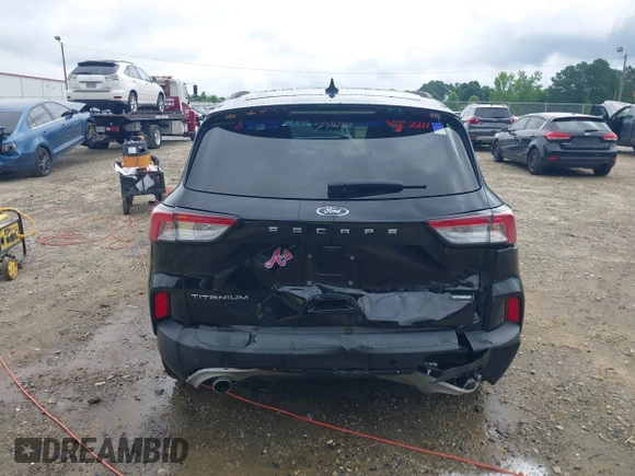 2021 Ford Escape Titanium Hybrid z VIN 1FMCU0DZ0MUA16798, wystawiony jako IAAI lot #42502086 z przebiegiem 107 250 mil mil oraz . Historia ofert i sprzedaży dostępna na DreamBid. Obrazek 6.