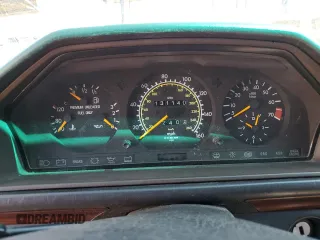 1994 Mercedes-Benz E with VIN WDBEA92E2RF283381, listed as a Copart auction lot 50025645 with 131,140 mi miles and Salvage Title. Bid and sale history available at DreamBid. Image 9.