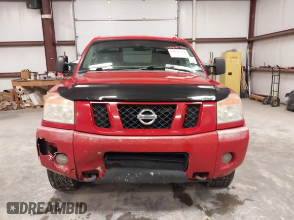 2012 Nissan Titan SV with VIN 1N6AA0EC7CN327973, listed as a IAAI auction lot 41841596 with 148,519 mi miles. Bid and sale history available at carsss.com. Image 12.
