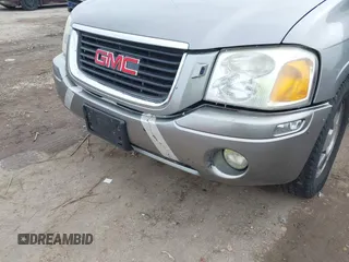 2005 GMC Envoy SLT with VIN 1GKDT13S352129944, listed as a IAAI auction lot 41527180 with 188,541 mi miles. Bid and sale history available at carsss.com. Image 6.