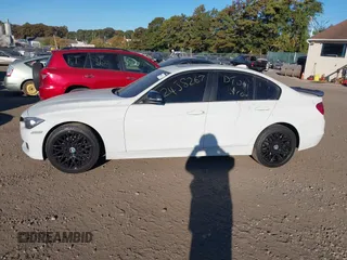 2014 BMW 3 Series 320i xDrive with VIN WBA3C3G51ENR25045, listed as a IAAI auction lot 40615577 with 150,046 mi miles. Bid and sale history available at carsss.com. Image 13.
