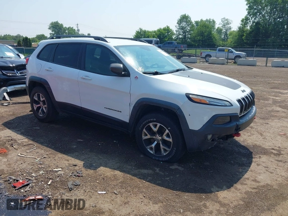 2014 Jeep Cherokee Trailhawk z VIN 1C4PJMBS0EW188976, wystawiony jako IAAI lot #42587233 z przebiegiem 191 670 mil mil oraz . Historia ofert i sprzedaży dostępna na DreamBid. Obrazek 1.