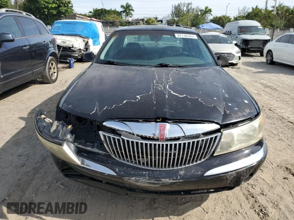 1998 Lincoln Continental with VIN 1LNFM97V8WY742639, listed as a Copart auction lot 82138303 with 268,814 mi miles and Salvage Title. Bid and sale history available at carsss.com. Image 5.