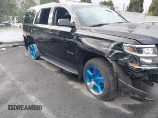 2016 Chevrolet Tahoe LS z VIN 1GNSCAEC8GR387676, wystawiony jako IAAI lot #41774142 z przebiegiem 36 695 mil mil oraz . Historia ofert i sprzedaży dostępna na DreamBid. Obrazek 18.
