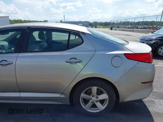 2015 Kia Optima LX with VIN 5XXGM4A79FG477619, listed as a IAAI auction lot 42561432 with 125,274 mi miles and . Bid and sale history available at DreamBid. Image 15.
