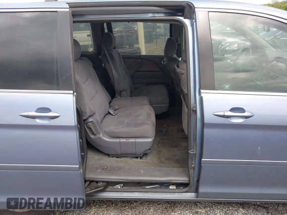 2007 Honda Odyssey EX z VIN 5FNRL38467B087065, wystawiony jako IAAI lot #42204370 z przebiegiem 242 844 mil mil oraz . Historia ofert i sprzedaży dostępna na DreamBid. Obrazek 8.