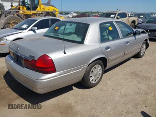 2005 Mercury Grand Marquis GS with VIN 2MEFM74W05X653375, listed as a IAAI auction lot 41995502 with 200,083 mi miles and . Bid and sale history available at DreamBid. Image 4.