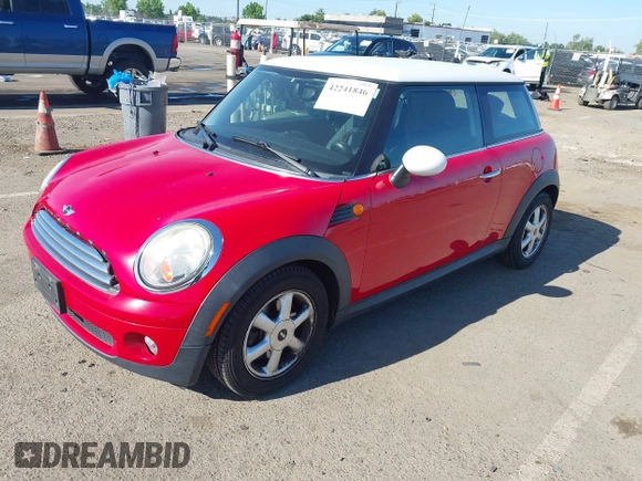 2010 MINI Hardtop with VIN WMWMF3C56ATZ61062, listed as a IAAI auction lot 42241846 with 79,593 mi miles and . Bid and sale history available at DreamBid. Image 2.