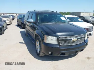 2011 Chevrolet Suburban LT with VIN 1GNSCJE09BR235355, listed as a IAAI auction lot 42030105 with 308,576 mi miles. Bid and sale history available at carsss.com. Image 1.