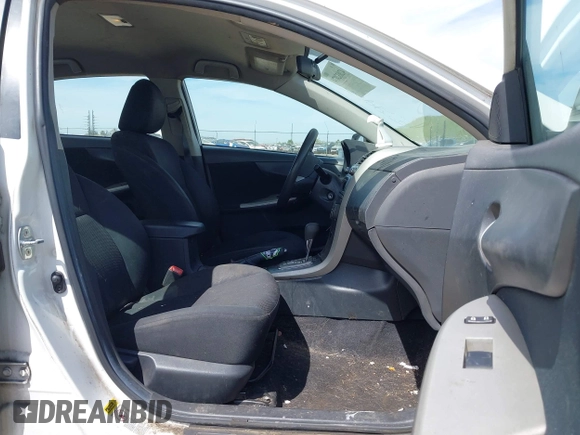 2011 Toyota Corolla L with VIN 2T1BU4EE0BC631879, listed as a IAAI auction lot 42032074 with 1 mi miles. Bid and sale history available at carsss.com. Image 5.
