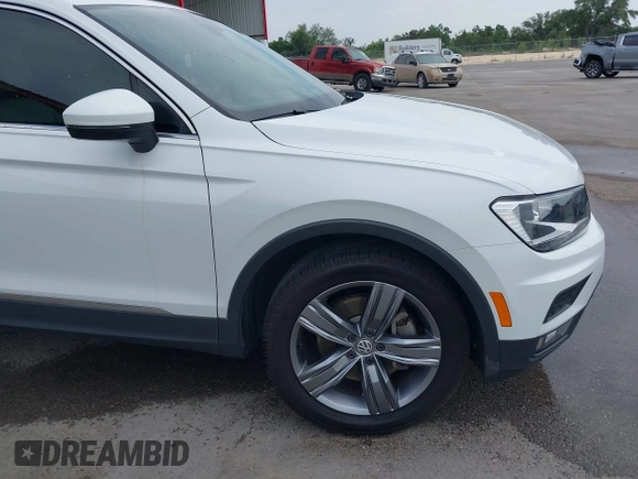 2020 Volkswagen Tiguan SE z VIN 3VV3B7AX4LM032609, wystawiony jako IAAI lot #42074359 z przebiegiem 52 404 mil mil oraz . Historia ofert i sprzedaży dostępna na DreamBid. Obrazek 18.