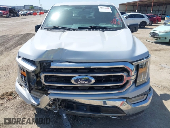 2021 Ford F-150 XL z VIN 1FTFW1E86MKD90402, wystawiony jako IAAI lot #42007680 z przebiegiem 103 724 mil mil oraz . Historia ofert i sprzedaży dostępna na DreamBid. Obrazek 12.