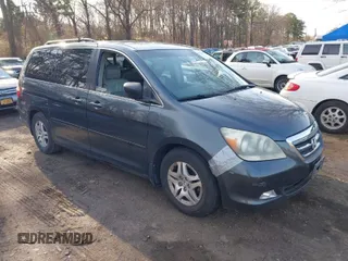 2005 Honda Odyssey EX-L with VIN 5FNRL38615B040637, listed as a IAAI auction lot 41920622 with 92,673 mi miles. Bid and sale history available at carsss.com. Image 1.