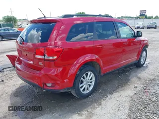 2014 Dodge Journey SXT z VIN 3C4PDCBG2ET161135, wystawiony jako IAAI lot #42233836 z przebiegiem 119 230 mil mil oraz . Historia ofert i sprzedaży dostępna na DreamBid. Obrazek 4.
