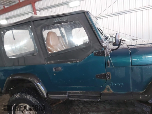 1995 Jeep Wrangler S with VIN 1J4FY19P0SP262341, listed as a IAAI auction lot 41672136 with 161,979 mi miles. Bid and sale history available at carsss.com. Image 13.