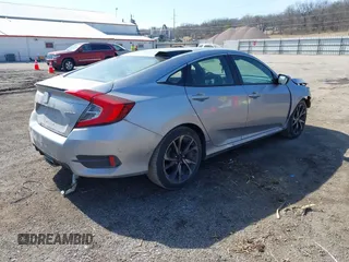 2021 Honda Civic Sport with VIN 2HGFC2F83MH540939, listed as a IAAI auction lot 41789508 with 100,274 mi miles and . Bid and sale history available at DreamBid. Image 4.