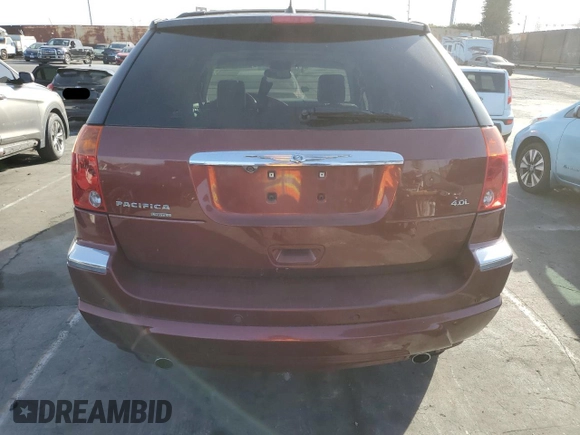 2007 Chrysler Pacifica z VIN 2A8GM78X57R197186, wystawiony jako Copart lot #41655605 z przebiegiem 142 636 mil mil oraz Szkoda całkowita • Salvage title. Historia ofert i sprzedaży dostępna na DreamBid. Obrazek 6.