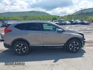 2017 Honda CR-V Touring with VIN 5J6RW2H91HL013526, listed as a IAAI auction lot 42181848 with 108,126 mi miles and . Bid and sale history available at carsss.com. Image 14.
