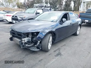 2017 Audi A4 Premium with VIN WAUGNAF4XHN005847, listed as a IAAI auction lot 41791442 with 104,355 mi miles. Bid and sale history available at carsss.com. Image 2.