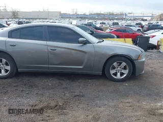 2011 Dodge Charger SE with VIN 2B3CL3CG0BH577061, listed as a IAAI auction lot 41889210 with 147,555 mi miles. Bid and sale history available at carsss.com. Image 6.