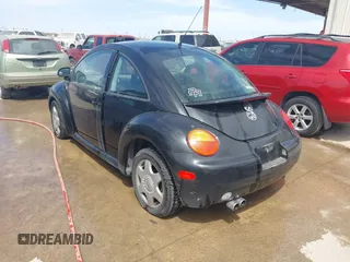1999 Volkswagen Beetle GLS z VIN 3VWCA21C2XM404338, wystawiony jako IAAI lot #41606143 z przebiegiem 192 205 mil mil oraz . Historia ofert i sprzedaży dostępna na DreamBid. Obrazek 3.