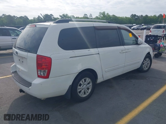 2012 Kia Sedona LX with VIN KNDMG4C7XC6446218, listed as a IAAI auction lot 42083645 with 151,844 mi miles. Bid and sale history available at carsss.com. Image 4.