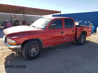 2000 Dodge Dakota Sport with VIN 1B7GL2AX1YS679788, listed as a Copart auction lot 84621604 with 0 mi miles and Salvage Title. Bid and sale history available at carsss.com. Image 1.