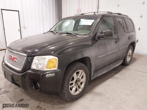 2006 GMC Envoy Denali with VIN 1GKET63M662310282, listed as a IAAI auction lot 41367523 with 216,451 mi miles. Bid and sale history available at carsss.com. Image 2.