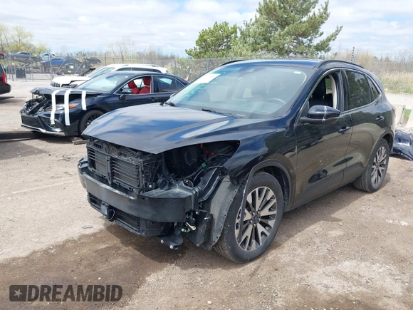 2020 Ford Escape Titanium Hybrid z VIN 1FMCU0DZ5LUB39205, wystawiony jako IAAI lot #42192828 z przebiegiem 47 878 mil mil oraz . Historia ofert i sprzedaży dostępna na DreamBid. Obrazek 2.
