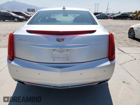 2016 Cadillac XTS Luxury Collection with VIN 2G61N5S35G9197325, listed as a Copart auction lot 55613225 with 131,404 mi miles and Salvage title. Bid and sale history available at DreamBid. Image 6.