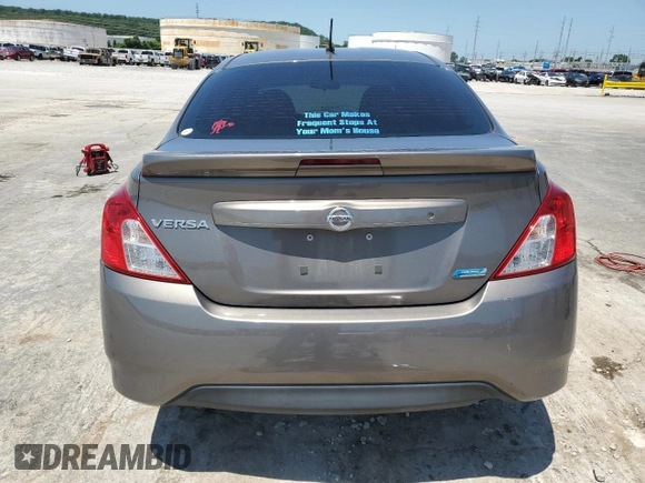 2015 Nissan Versa SV with VIN 3N1CN7AP2FL953150, listed as a Copart auction lot 61594975 with 105,951 mi miles and Salvage title. Bid and sale history available at DreamBid. Image 6.