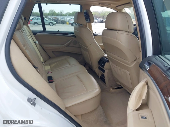 2010 BMW X5 35d with VIN 5UXFF0C52ALT75063, listed as a IAAI auction lot 41924828 with 104,513 mi miles. Bid and sale history available at carsss.com. Image 8.