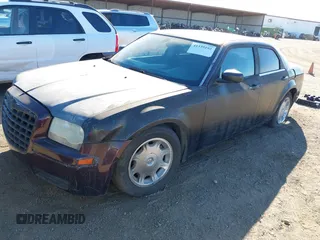 2005 Chrysler 300 with VIN 2C3JA43R05H539602, listed as a IAAI auction lot 41335192 with 1 mi miles. Bid and sale history available at carsss.com. Image 2.