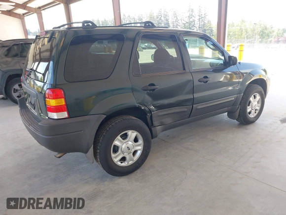 2003 Ford Escape XLT Popular 2 with VIN 1FMCU931X3KC16646, listed as a IAAI auction lot 42160863 with 130,603 mi miles and . Bid and sale history available at DreamBid. Image 4.