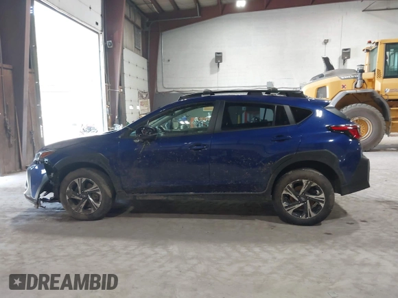 2024 Subaru Crosstrek Premium z VIN JF2GUADC3R8318644, wystawiony jako IAAI lot #42558586 z przebiegiem 33 648 mil mil oraz . Historia ofert i sprzedaży dostępna na DreamBid. Obrazek 14.