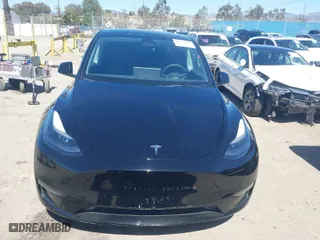 2023 Tesla Model Y Long Range with VIN 7SAYGDEE9PF591096, listed as a IAAI auction lot 41762917 with 22,582 mi miles. Bid and sale history available at carsss.com. Image 12.