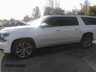 2015 Chevrolet Suburban LTZ with VIN 1GNSKKKC0FR551031, listed as a IAAI auction lot 40694559 with 184,261 mi miles. Bid and sale history available at carsss.com. Image 14.