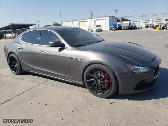 2014 Maserati Ghibli S Q4 with VIN ZAM57RTA7E1085782, listed as a Copart auction lot 75537634 with 111,616 mi miles and Salvage Title. Bid and sale history available at carsss.com. Image 4.