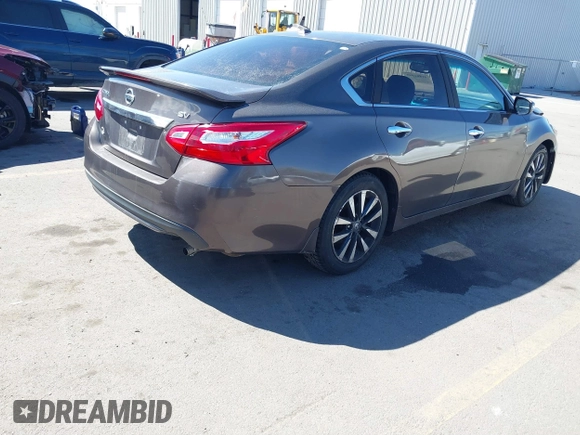 2016 Nissan Altima S with VIN 1N4AL3AP3GC112394, listed as a IAAI auction lot 41861895 with 89,134 mi miles and . Bid and sale history available at DreamBid. Image 4.
