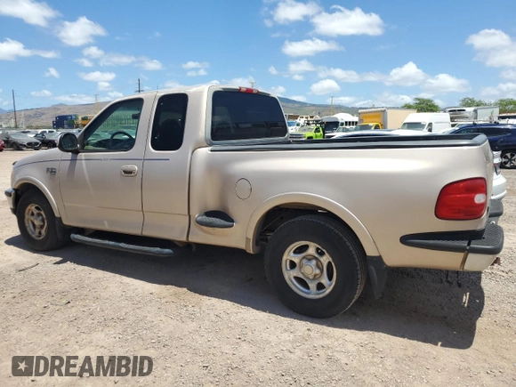 1998 Ford F-150 XL with VIN 1FTRX07L6WKB62554, listed as a Copart auction lot 67597854 with 100,528 mi miles and Salvage Title. Bid and sale history available at carsss.com. Image 2.