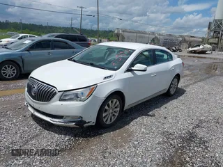 2014 Buick LaCrosse with VIN 1G4GA5GR0EF211194, listed as a IAAI auction lot 42251943 with 146,518 mi miles and . Bid and sale history available at DreamBid. Image 2.