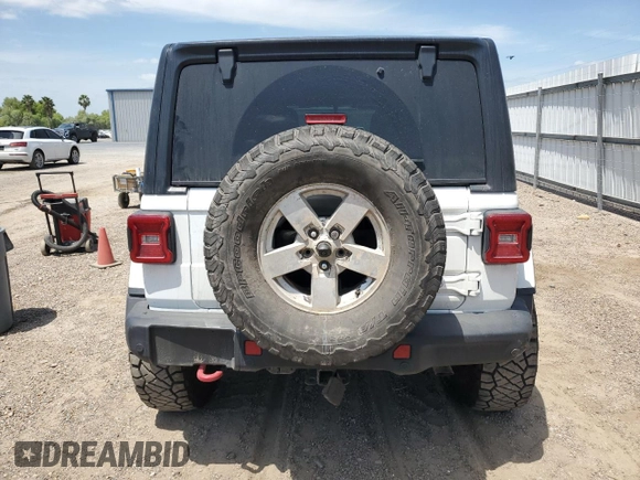 2018 Jeep Wrangler Unlimited Rubicon with VIN 1C4HJXFG9JW308991, listed as a Copart auction lot 53638955 with 95,508 mi miles and Salvage title. Bid and sale history available at DreamBid. Image 6.