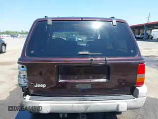 1997 Jeep Grand Cherokee TSi with VIN 1J4FX58S2VC747897, listed as a IAAI auction lot 42033868 with 119,924 mi miles. Bid and sale history available at carsss.com. Image 16.